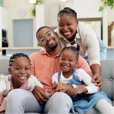 a happy family on the couch